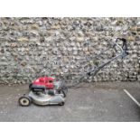 A Honda HR194 petrol lawnmower.