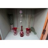An Orrefors clear glass decanter and stopper, 42cm high; together with two German ruby flashed