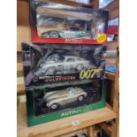 Autoart: The James Bond Collection, Goldfinger DB5; together with an Aston Martin DBR9 LeMans; and a