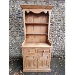 An old pine dresser and rack, 92cm wide x 46cm deep x 198cm high.