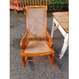 An old rattan rocking chair.