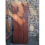 An old oak door, 196cm x 75cm.