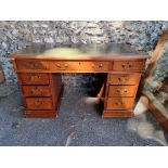 An old mahogany pedestal desk, 120cm wide x 60cm deep x 70cm high.