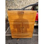 An Ercol bureau, 82.5cm wide x 43cm deep x 110cm high.