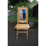 A small antique pine dressing table, 65cm wide x 62cm deep x 165cm high.