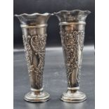 A pair of Edwardian pierced silver vases, Birmingham 1903, 18cm high. (2)