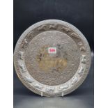 A Ceylonese white metal circular tray, indistinct marks, inscribed '...HMS Colombo, 1945', 564g,