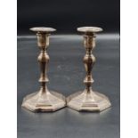A pair of Victorian silver candlesticks, by Hawksworth, Eyre & Co Ltd, Sheffield 1894, 17cm high. (