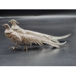 A pair of continental white metal pheasants, with detachable heads, stamped '800', 1062g, largest