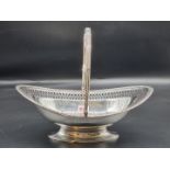 A George III pierced silver swing handled oval basket, by William Allen III, London 1805, 940g, 37cm