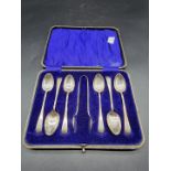 A cased set of six silver Old English pattern teaspoons and sugar tongs, by John Round & Son Ltd,