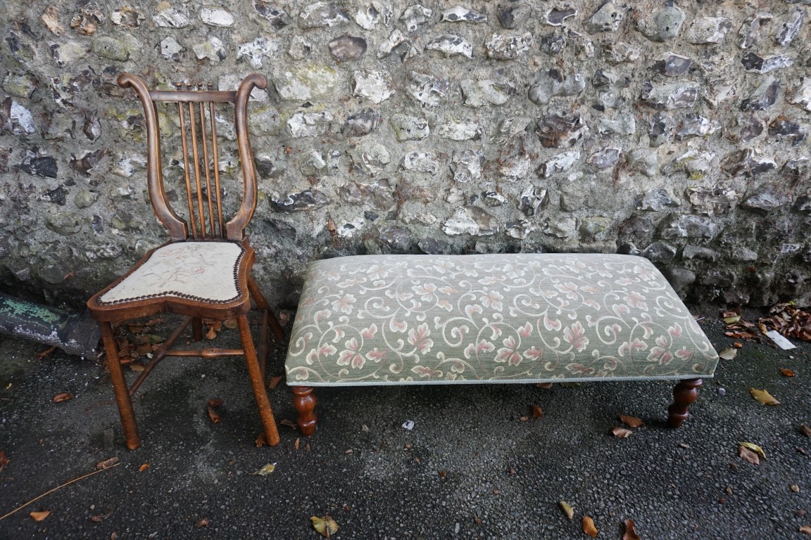 A small lyre back chair; together with a long upholstered footstool.