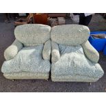 A pair of Heals 'Howard' upholstered armchairs, (a.f.).