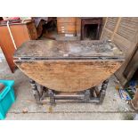 An 18th century oak gateleg table, 82cm wide x 66cm high, (missing drawer).