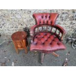 A red leather button desk chair; together with an inlaid sewing table, 53cm high x 32cm wide.