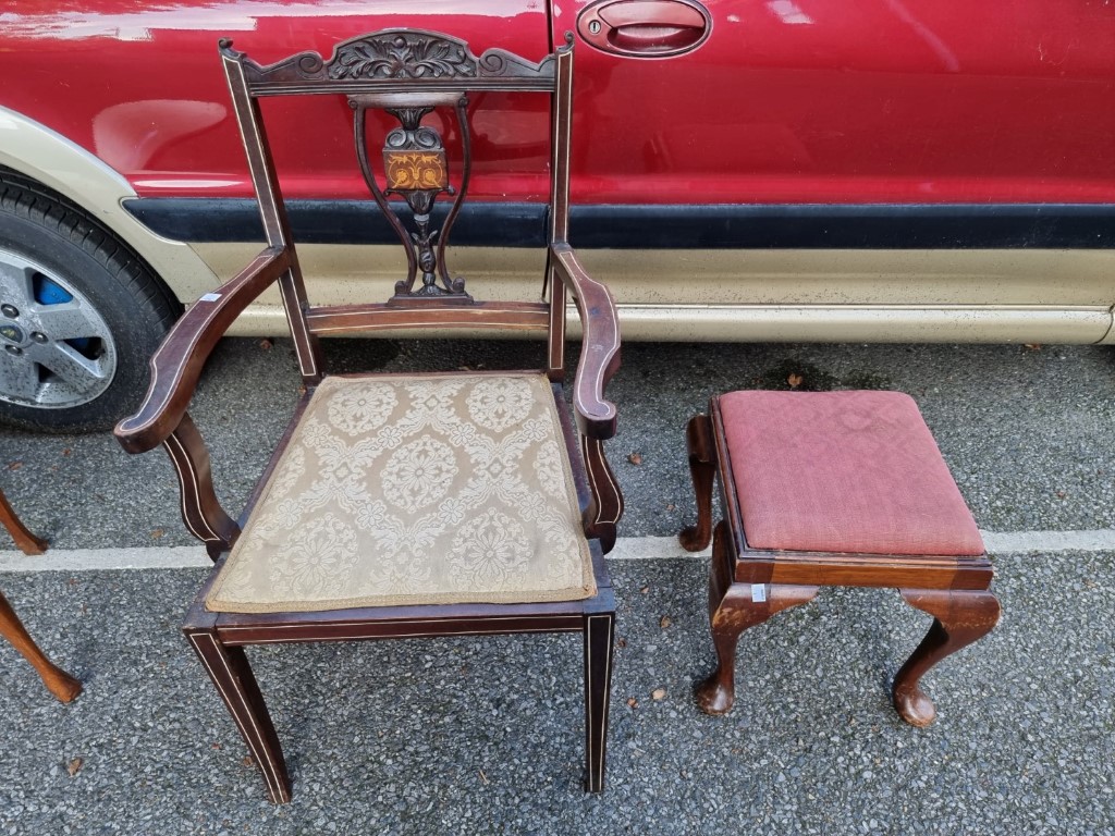 An Edwardian inlaid salon elbow chair; together with a small antique stool.