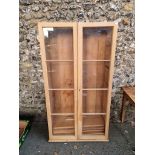 A Victorian glazed pine bookcase, 82cm wide x 32cm deep x 152cm high.