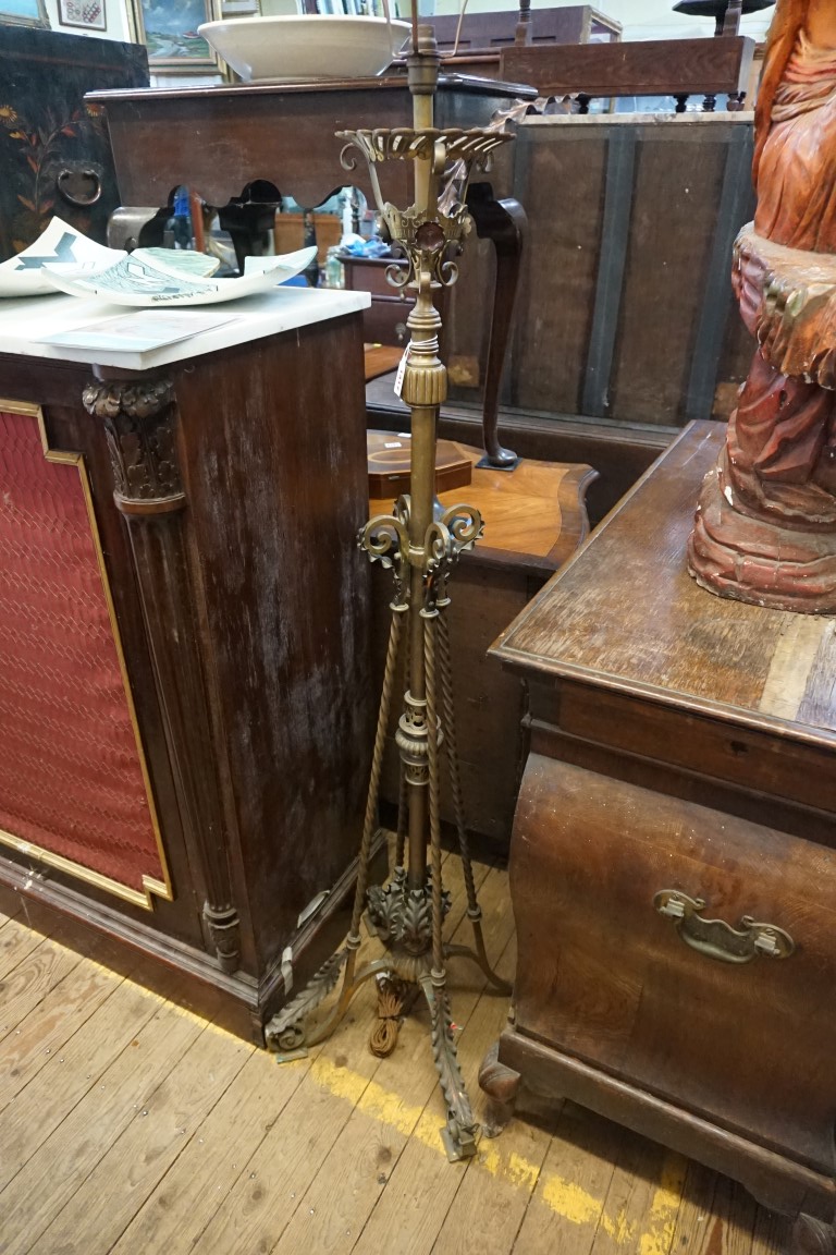 An impressive brass and copper standard lamp, in the manner of W A S Benson.