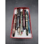 A collection of vintage pens, to include four with 14ct nibs. (12)