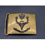 A 'Seaforth Highlanders' officer's gilt metal belt buckle.