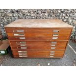 A nine drawer plan chest, 130cm wide x 93cm deep x 88.5cm high.