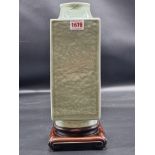 A Chinese celadon Cong vase, Qing, 29cm high, (drilled through base and repaired to rim), on