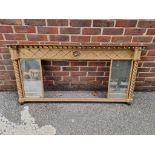 An early 19th century gilt overmantel mirror, 153cm wide, (a.f.).