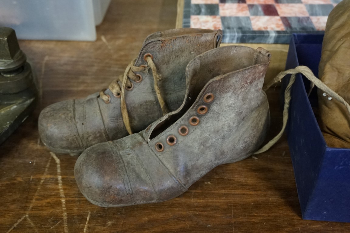 An antique pair of child's leather rugby boots; together with a similar pair of boxing gloves. - Image 3 of 3