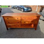 A modern hardwood sideboard, 155cm wide x 51cm deep x 77cm high.