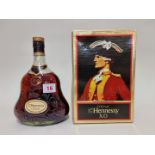 A 24 fl.oz. bottle of Hennessy XO cognac, 1960s/70s bottling, in card box.