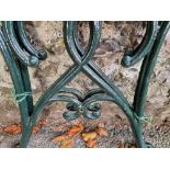 A pair of cast iron table supports, 66cm wide x 62cm high.