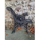 A pair of cast iron bench ends.