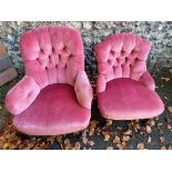 Two red upholstered nursing chairs.