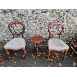 A pair of mahogany balloon back chairs; together with a small tripod table, 51cm high.