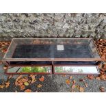 A glass table top display cabinet, 134cm wide x 45cm deep.