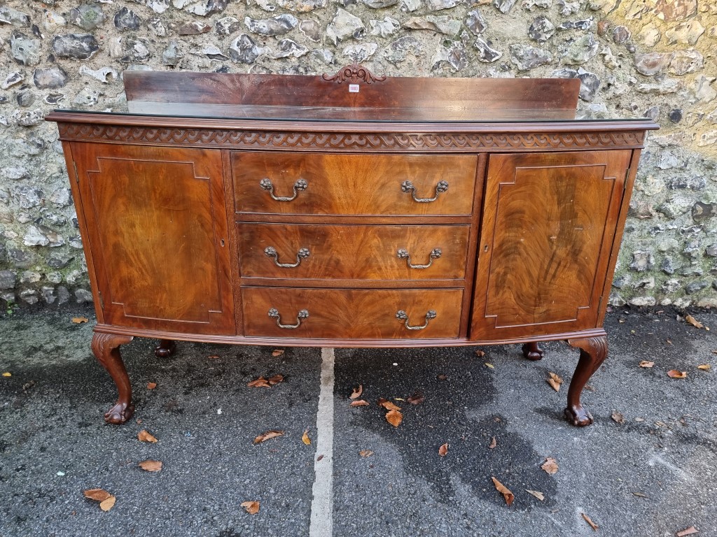 A 1920s mahogany bowfront sideboard, 153cm wide.