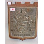 A 'Dunkerque' commemorative brass plaque, 25 x 20.5cm, on pine shield mount.