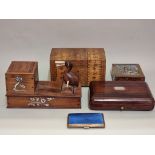 A small collection of boxes, caskets and similar, to include a novelty bone inlaid cigarette box;