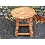 An old pine stool, 40cm high x 41cm wide.