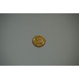 Coins: a Victoria 1897 gold sovereign.