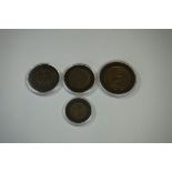 Coins: four Georgian copper coins; to include an 1807 Soho Mint copper penny; and a George II 1752