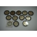 Coins: eleven George VI silver and other half crown coins, including nine pre-1947; together with