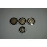 Coins: four Victoria silver coins; comprising three silver half crowns, 1889; 1892 and 1895 and an