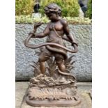 A Coalbrookdale stick stand of Hercules wrestling a snake