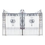 A pair of wrought iron gates and uprights