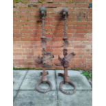 A pair of impressive wrought and cast iron architectural fittings