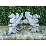 A pair of unusual cast iron Griffin terminals