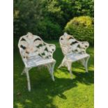 A similar pair of Coalbrookdale Fern and Blackberry pattern cast iron chairs