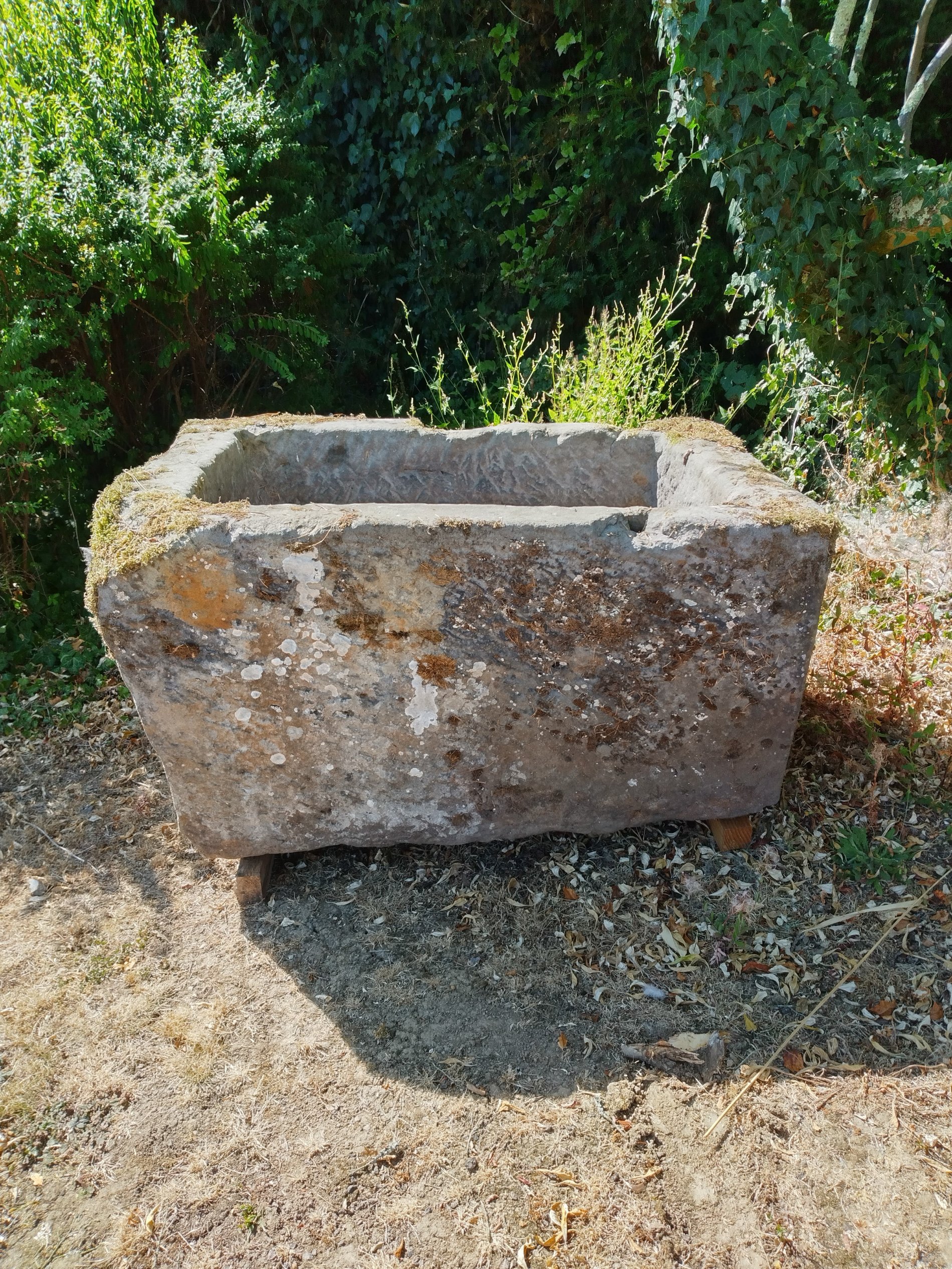 A rare Georgian dated carved stone trough