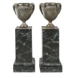 A pair of Val d' Osne foundry cast iron urns